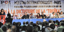 Des milliers de personnes à l'Espace Charenton à Paris, au meeting du POI, écoutant ici la représentante du syndicat des enseignants grecs.